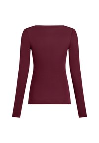 Top de manga larga en un profundo color burdeos, con un escote amplio y una forma ajustada. Fabricado en una tela suave y lisa, con un diseño simple y sin costuras.