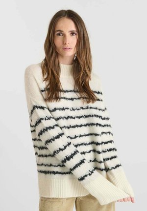 Cremefarbener Pullover mit schwarzen horizontalen Streifen, gerippten Bündchen und Saum, aus einem weichen, strukturierten Material. Lockere Passform mit überschnittenen Schultern.
