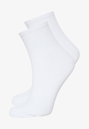 White cotton ankle socks with a smooth texture and reinforced toe, featuring a ribbed cuff at the top. Sold as a pair.