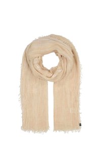 Beige vävd scarf med en texturerad yta, fransade kanter och subtil dekorativ sömnad längs ena sidan.