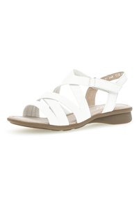 Valkoinen nahkasandaali, jossa on päällekkäiset hihnat, avonaiset varpaat ja matala ruskea korokepohja. Pehmeä pohja lisää mukavuutta. Ristikkäinen hihnasuunnittelu.