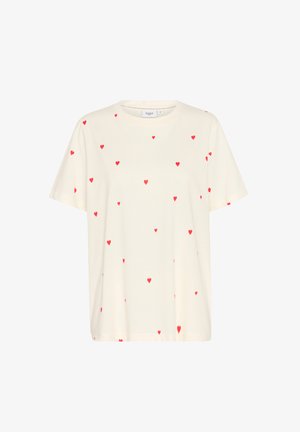 Kreminė trumpo rankovės marškinėliai su išsibarsčiusiais raudonais širdelių raštais, apvaliu kaklu, laisvu siluetu ir minkšta medvilne.