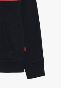 Levi's® WAISTCOAT - Tröja med dragkedja - navy