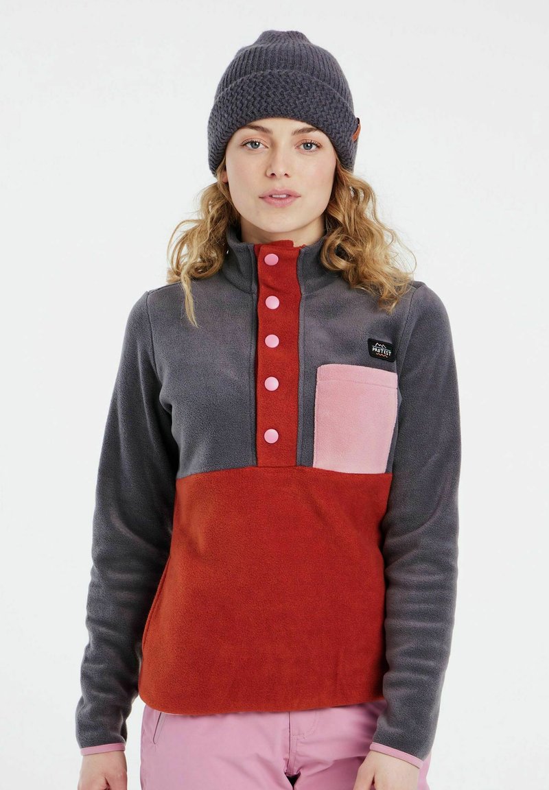 Fleece pullover met een hoge kraag, grijs en rood kleurblok ontwerp, voorzien van roze knopen en zak, zachte textuur, casual pasvorm.