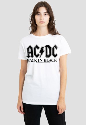 White cotton t-shirt featuring a black graphic print of "AC/DC BACK IN BLACK" with bold lettering and lightning bolt detail.