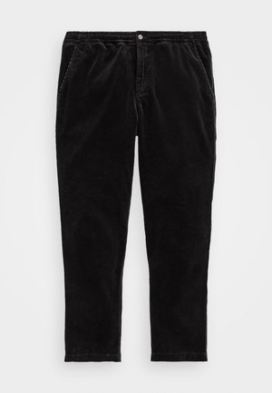 Schwarze Cordhose mit elastischem Bund, Knopfleiste vorne, Seitentaschen und geradem Bein.