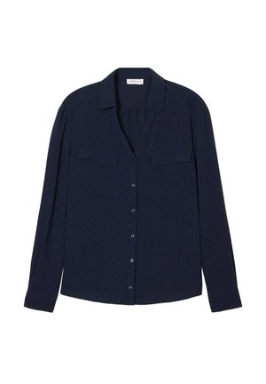 Chemise à manches longues bleu marine avec un col, deux poches poitrine, fermeture à boutons et un motif texturé sur l'ensemble.