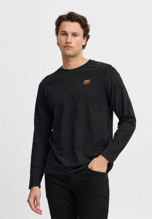 Black long-sleeve t-shirt in cotton with crew neck, featuring a small colorful logo on the left chest and smooth texture.