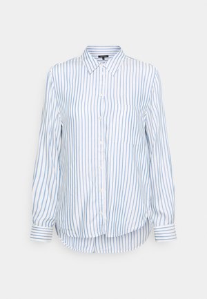 Bílá košile s dlouhým rukávem a světle modrými vertikálními pruhy. Má zapínání na knoflíky vpředu, límec a jednu náprsní kapsu. Zakřivený lem.