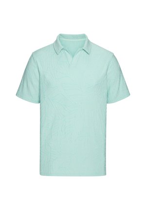 Light blue short-sleeve polo shirt with subtle textured leaf pattern and a classic collar with a small V-neck opening.