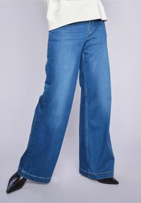 DELUXE - Traperice opuštenog kroja - mid blue