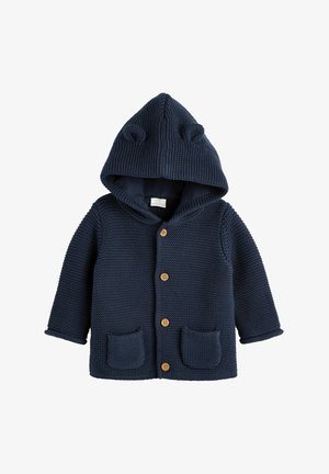 Cardigan bébé tricoté bleu marine avec capuche, petites oreilles en tissu, boutons en bois sur le devant et deux poches avant.