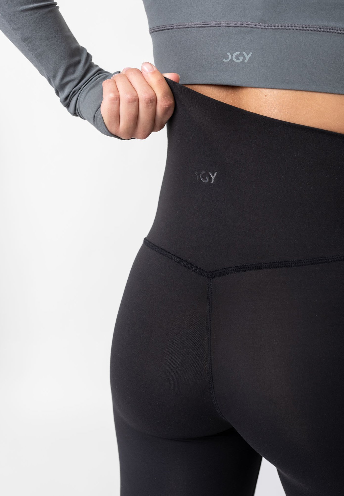 OGY Sportswear PLUMA GLEAM - SHAPING SPORTLEGGING - Legging - black/zwart -  Zalando.nl
