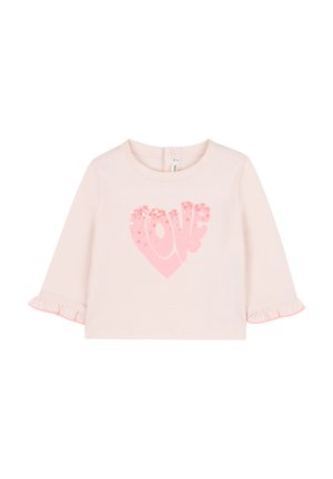  Lichtroze blouse met lange mouwen en een gerimpelde zoom, versierd met een hartvormige afbeelding van roze pailletten met de tekst "love". Zacht, katoenen materiaal.