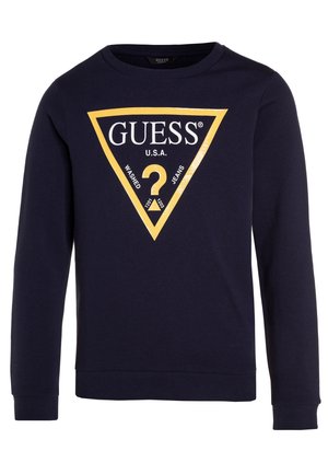 Granatowa bluza z długim rękawem z dużym żółtym trójkątnym logo z napisem "GUESS U.S.A." i znakiem zapytania na środku.