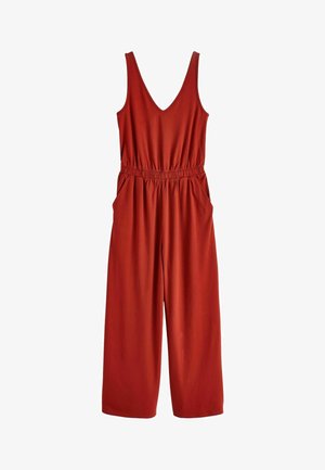 Punane, ilma varrukat jumpsuit V-kaelusega, elastse vöökoht, küljetaskud; valmistatud pehmest kangast ja omab laia jala disaini.
