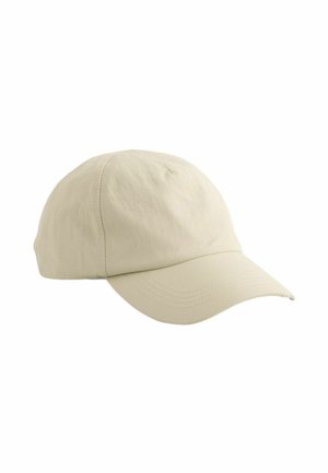 Beige baseball cap with curved brim and visible stitching, made from smooth fabric, shown against a white background.