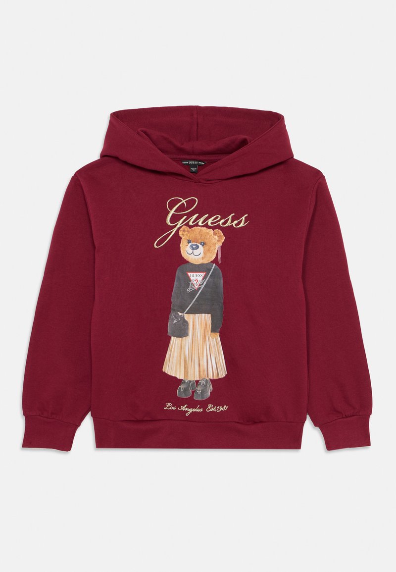 Hoodie bordeaux avec un graphisme d'un ours habillé d'un haut noir et d'une jupe plissée. Logo "Guess" brodé en or au-dessus du graphisme.