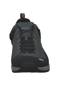 Dark grey hiking shoe with black toe cap, orange accents, laces, and breathable mesh panels. Rugged sole designed for traction and stability.