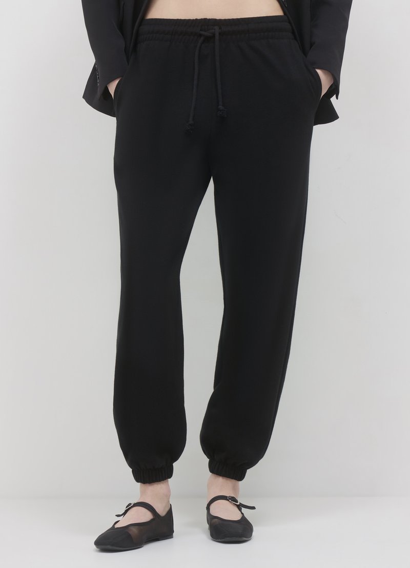 Calliope GINNICO UNITA - Jogginghose - ultrablack