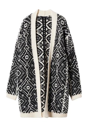 Zwart-witte gebreide cardigan met open voorkant en geometrisch patroon, lange mouwen en contrasterende crèmekleurige biezen aan kraag, manchetten en zoom.