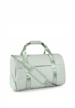 Hellgraue zylindrische Reisetasche mit gepolstertem Schultergurt, zwei Griffen und seitlicher Reißverschlusstasche vor weißem Hintergrund.