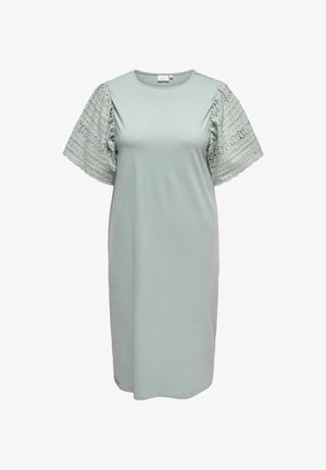 Világoszöld pamutruha rövid, mintás csipkeujjakkal és kerek nyakkal. A fazon egyenes, térdhez érő hosszúságú.