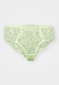 Bikini in pizzo di colore verde chiaro, con motivi floreali, bordi ondulati e una morbida fascia in satin.