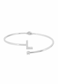 Silver bangle bracelet featuring a diamond-studded letter "L" and a round clear gemstone, with a smooth, polished finish.