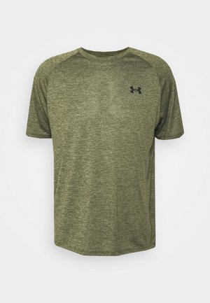 Short-sleeve, olive green athletic shirt made of textured fabric with a black logo on the left chest and contrasting shoulder design.