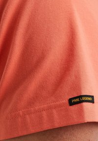 PME Legend AMERICAN pomarańczowy