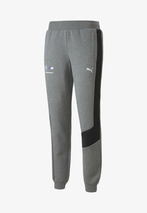 Graue Puma-Sweathosen mit schwarzen Seitenpaneelen, gerippten Bündchen, BMW Motorsport-Logo auf dem linken Oberschenkel und Puma-Logo auf dem rechten Oberschenkel.