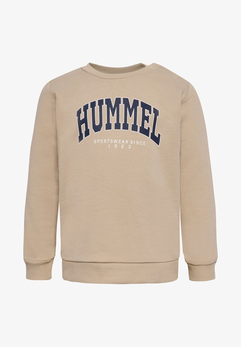 Beżowa bluza z okrągłym dekoltem, długimi rękawami, ściągaczami przy mankietach i u dołu, z logo "HUMMEL" w ciemnym niebieskim kolorze na piersi.
