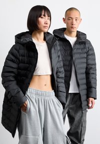Rains LOHJA LONG PUFFER JACKET UNISEX - Manteau d'hiver - black