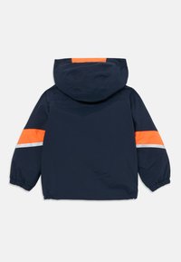 Navy blue hooded jacket with bright orange and white reflective stripes on sleeves and orange patch on hood, elastic cuffs and hem.