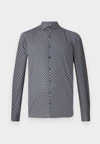 Long-sleeved button-up shirt in dark navy with a repeated white floral pattern. Features a pointed collar and front buttons. Smooth fabric texture.