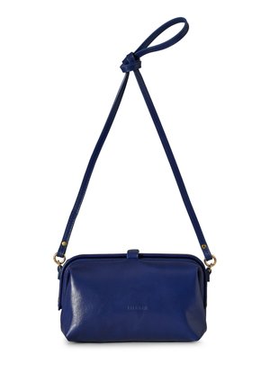 Navy blue leather shoulder bag with adjustable strap, gold hardware, and rectangular shape, embossed brand name on front.