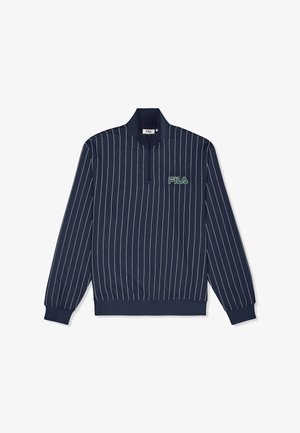 Jersey azul marino de manga larga con rayas verticales blancas, media cremallera frontal, puños acanalados y logo verde de FILA en el pecho izquierdo.