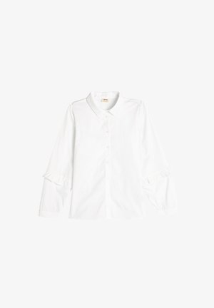 Hvid bluse med lange ærmer, krave, knaplukning og flæse-detaljer på ærmerne. Fremstillet af glat stof med en klassisk pasform.