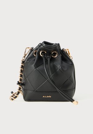 Black quilted leather drawstring bucket bag with gold chain strap and ALDO logo on front.