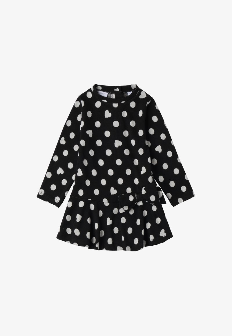 Czarna sukienka z długim rękawem, w białe kropki i wzory serc, z rozkloszowaną spódnicą i kokardą w talii.