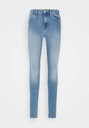 Lichtblauwe skinny jeans met knopen aan de voorkant en rits, ontwerp met vijf zakken en lichte vervaging op de dijen en knieën.