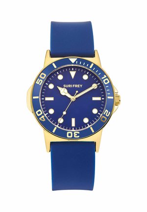 Blue and gold wristwatch with round dial, luminous hour markers, rotating bezel, and blue silicone strap, brand name Suri Frey on face.