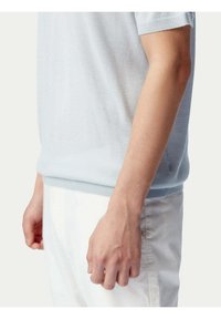 GOBI Cashmere Piké - mottled light grey