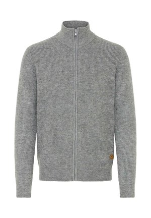 Šedý zip-up svetr vyrobený z texturovaného pleteného materiálu. Disponuje vysokým límcem, dlouhými rukávy a malou nášivkou loga na dolním levém okraji.