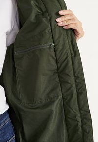 Cellbes of Sweden LONG WITH DOUBLE OPENING - Vinterfrakke - dark green