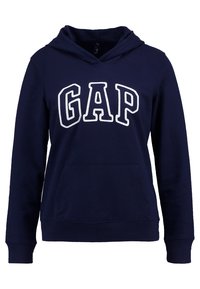 Sweat à capuche bleu marine en coton, avec une poche frontale et une capuche à cordon de serrage. "GAP" est affiché en grandes lettres blanches sur le devant.