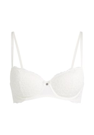 Witte kanten beha met verstelbare bandjes en een klein decoratief strikje en bedeltje middenvoor.