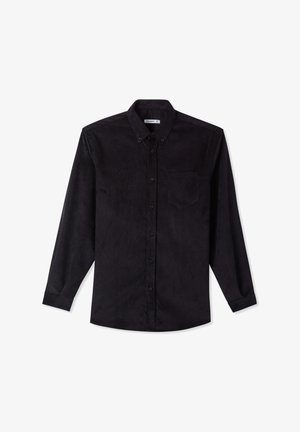 Camicia nera di velluto a coste con bottoni, maniche lunghe, una tasca frontale e un colletto classico. Tessuto morbido con motivo a coste verticali.