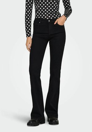 WOW MITTLERE TAILLE AUSGESTELLT  - Vaqueros a campana - washed black